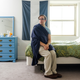 The honorable Sôgmô of The State of Sandus, William Soergel, poses in his College Park, Maryland apartment. He was hosting a housewarming dinner and celebration of his micronation’s harvest festival, Lamas on Aug. 1, 2015 in College Park, Md. He has since moved to Michigan.